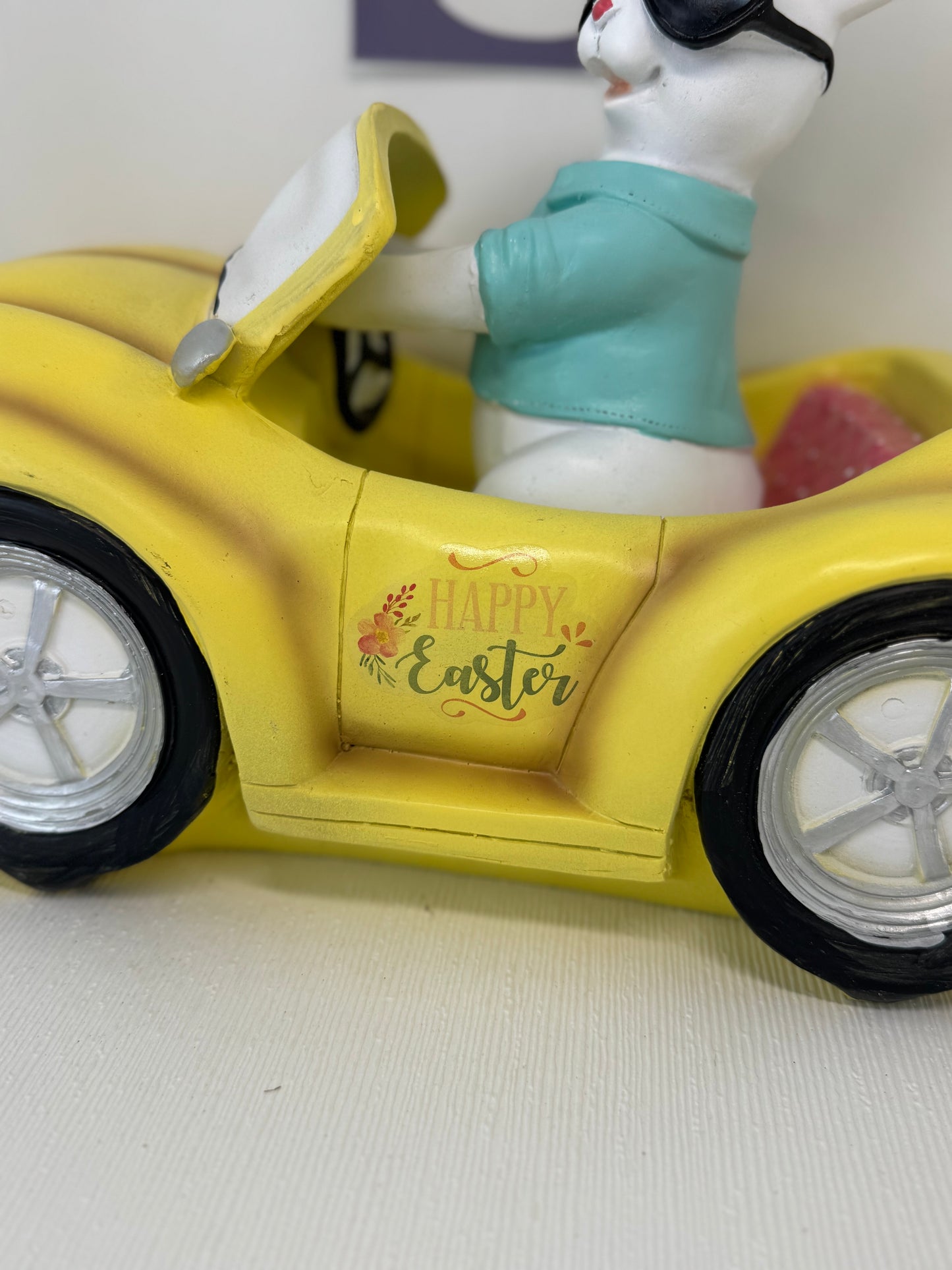 Huge Easter Bunny with Sunglasses Driving Yellow Volkswagen