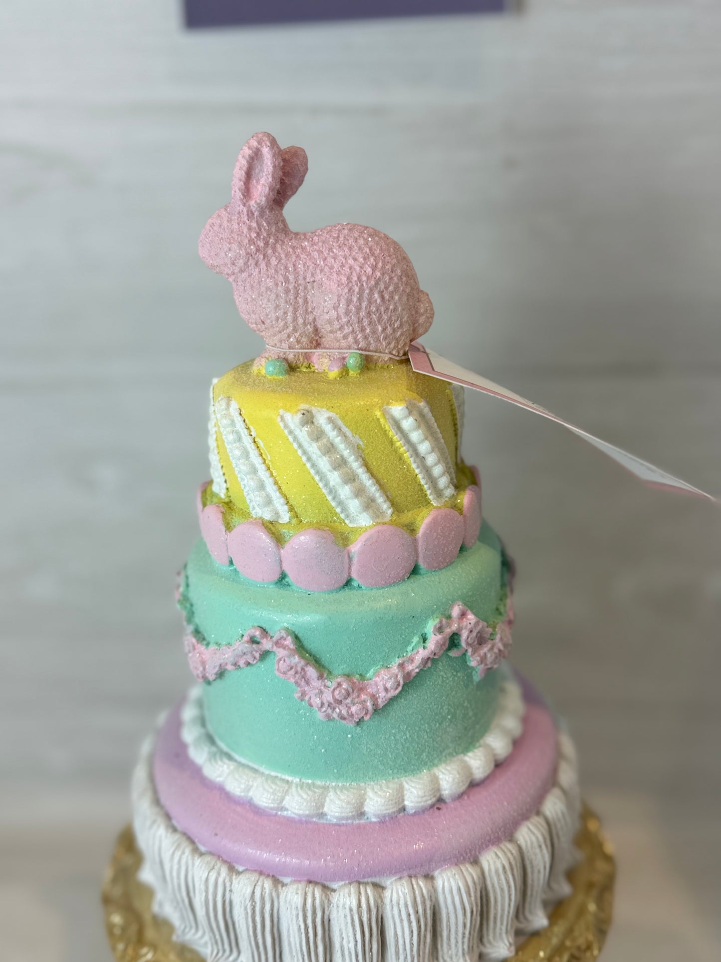 Cupcakes & Cashmere Easter Bunny Tiered Cake On Pedestal