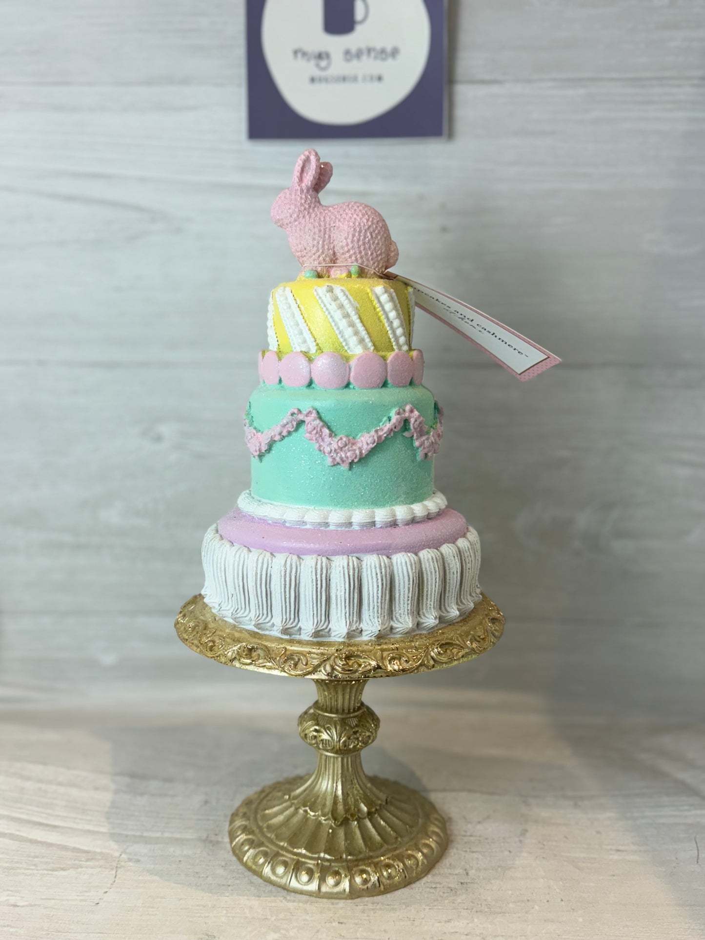 Cupcakes & Cashmere Easter Bunny Tiered Cake On Pedestal