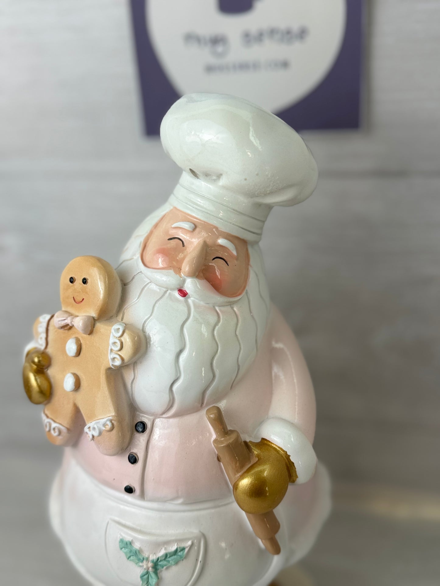 Whimsical Pink Santa Claus with Cookie Figure