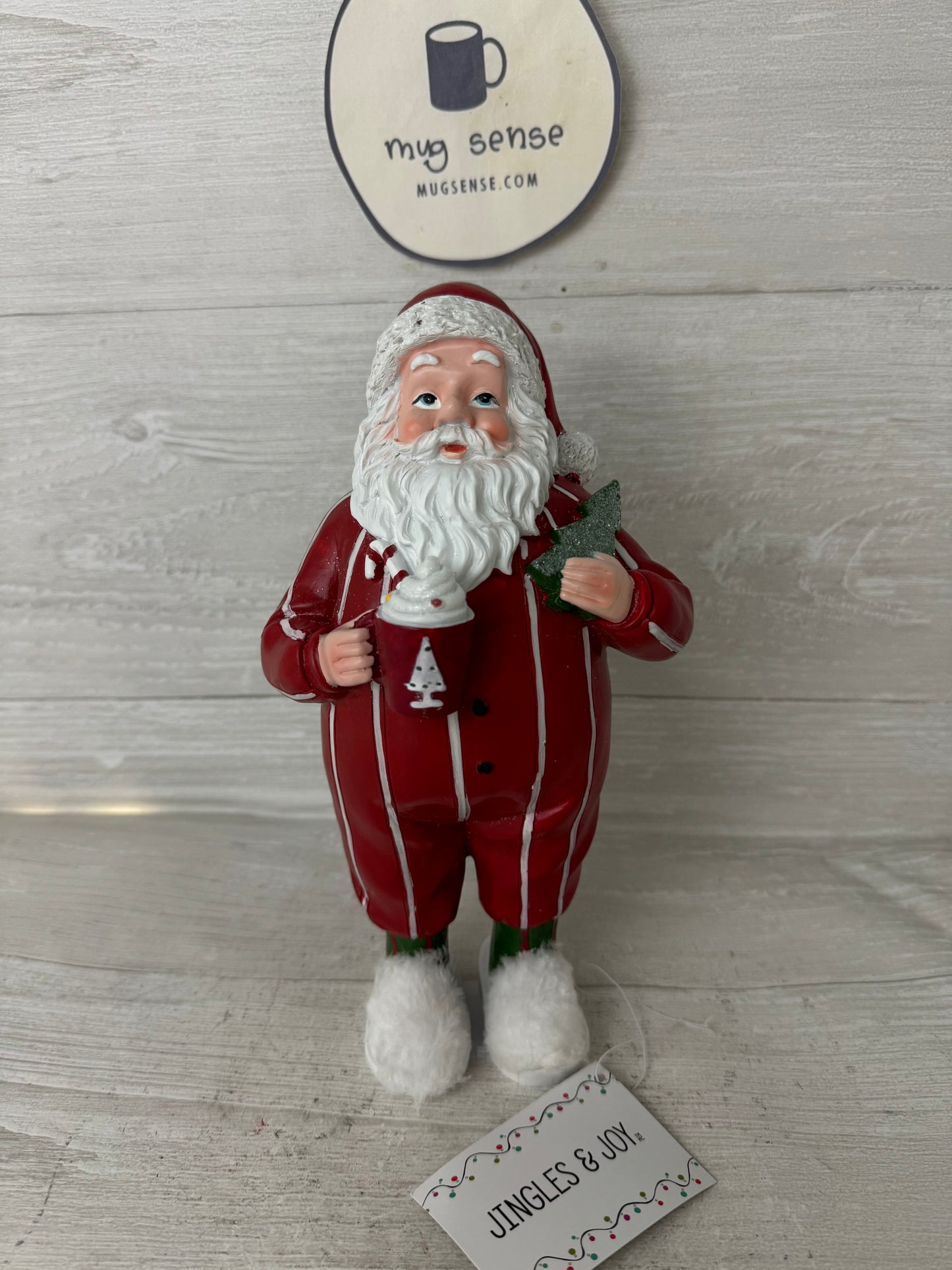 Santa In Pajamas & Fuzzy Slippers Figure