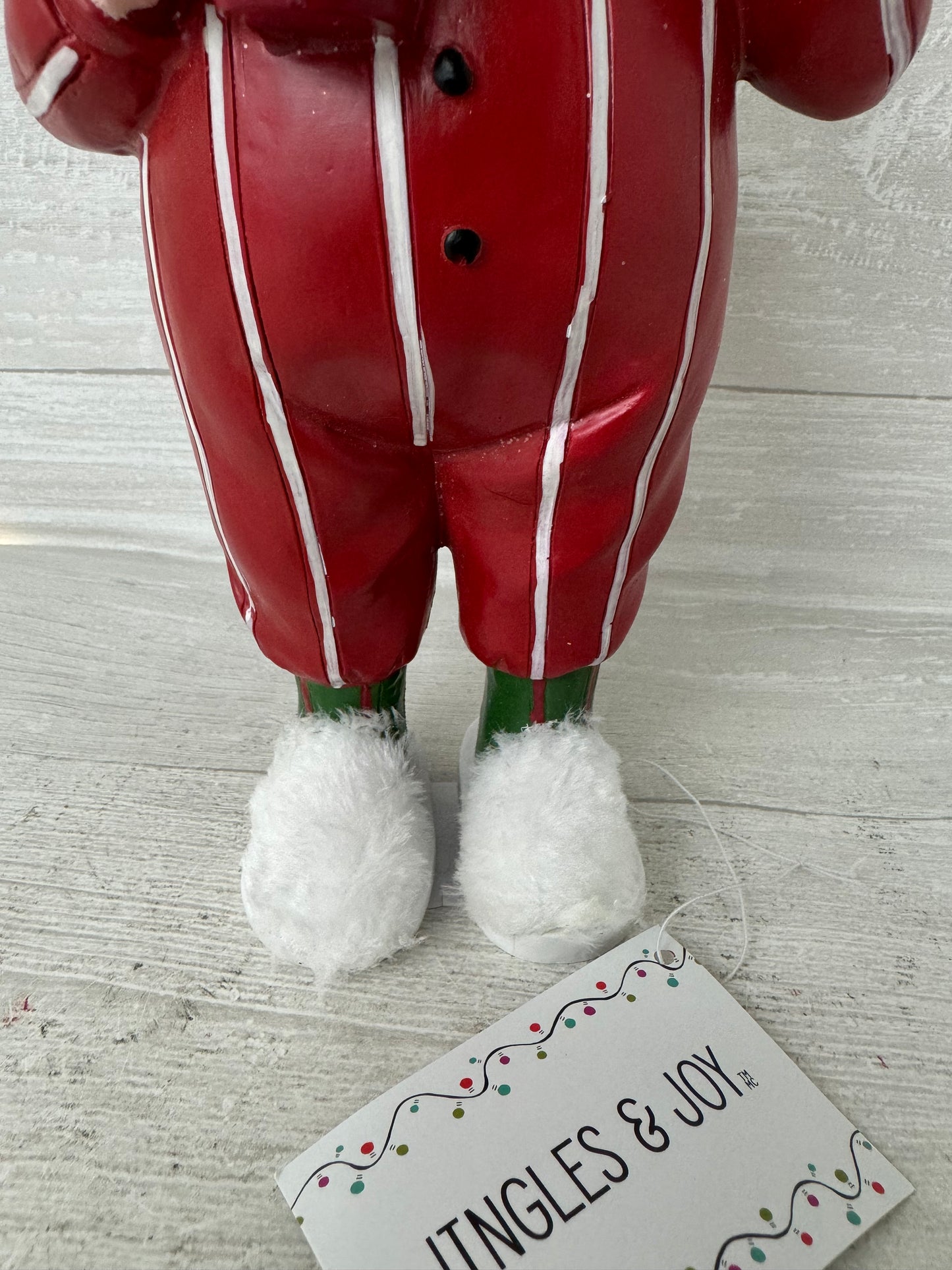 Santa In Pajamas & Fuzzy Slippers Figure