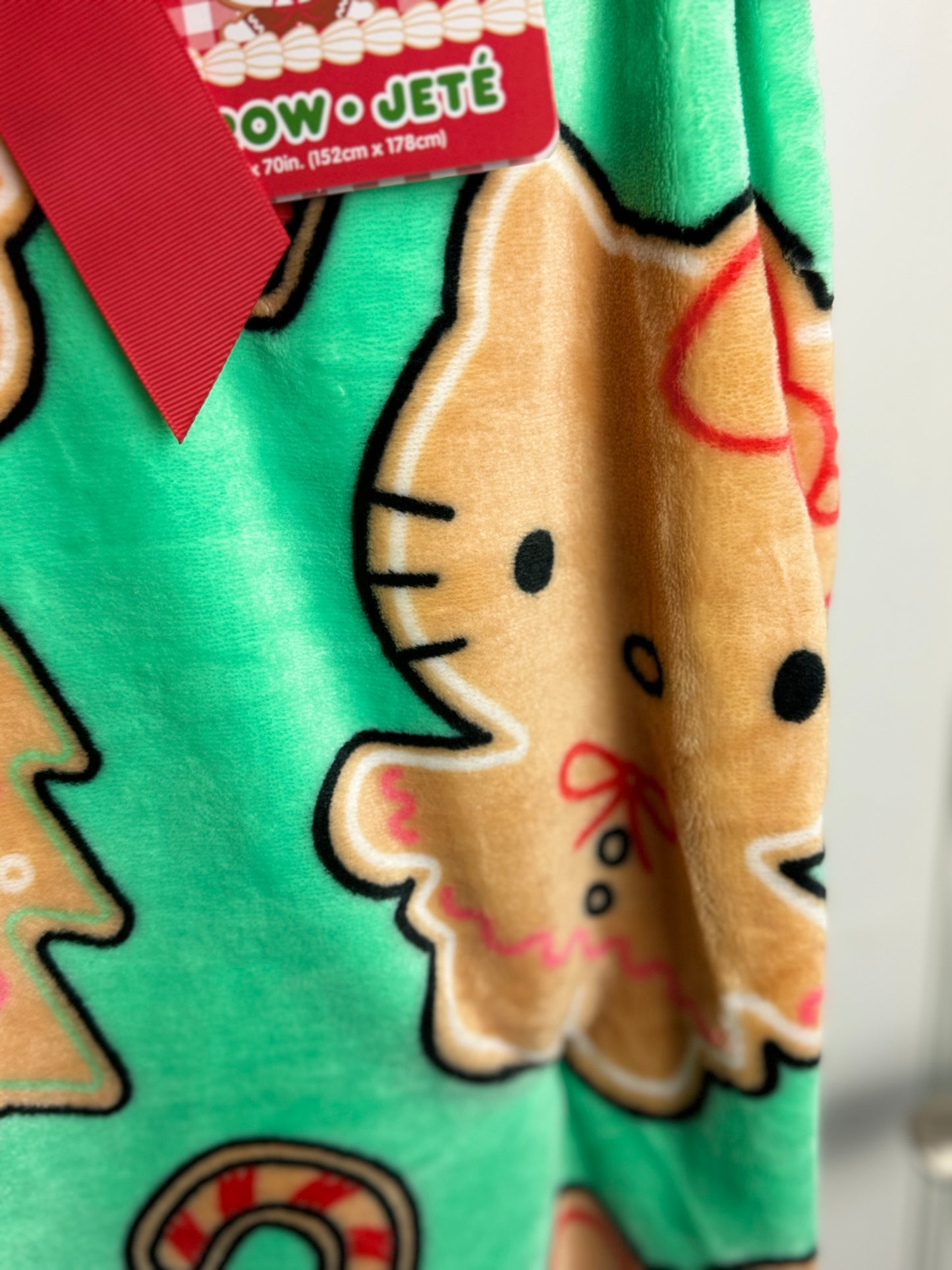 Hello Kitty Gingerbread Cookie Teal Throw Blanket