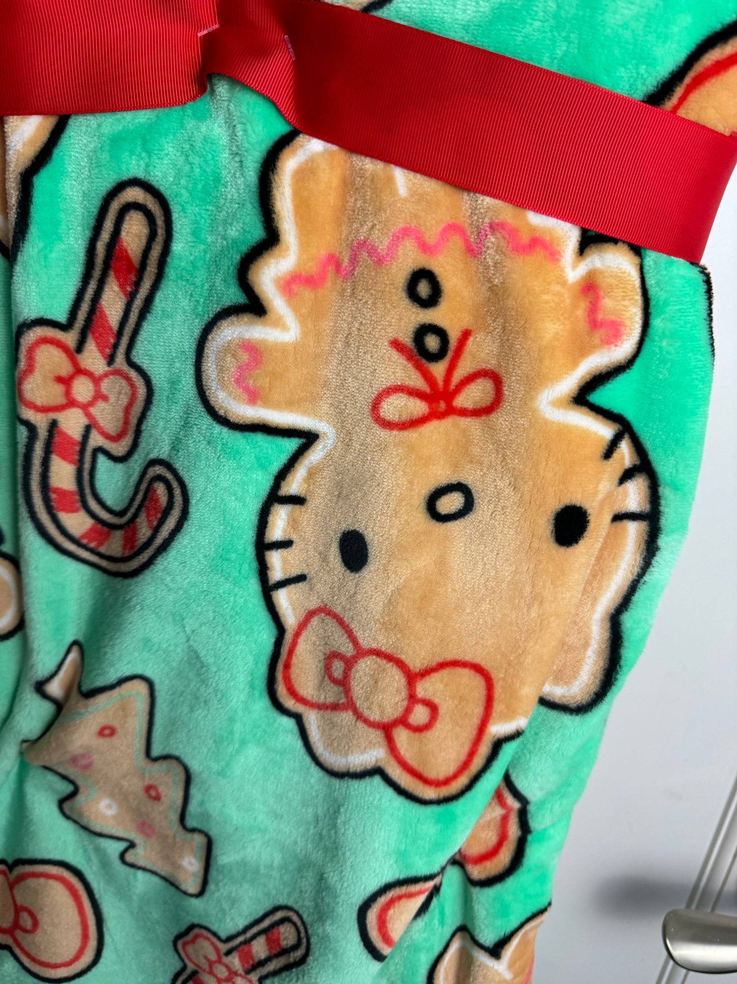 Hello Kitty Gingerbread Cookie Teal Throw Blanket